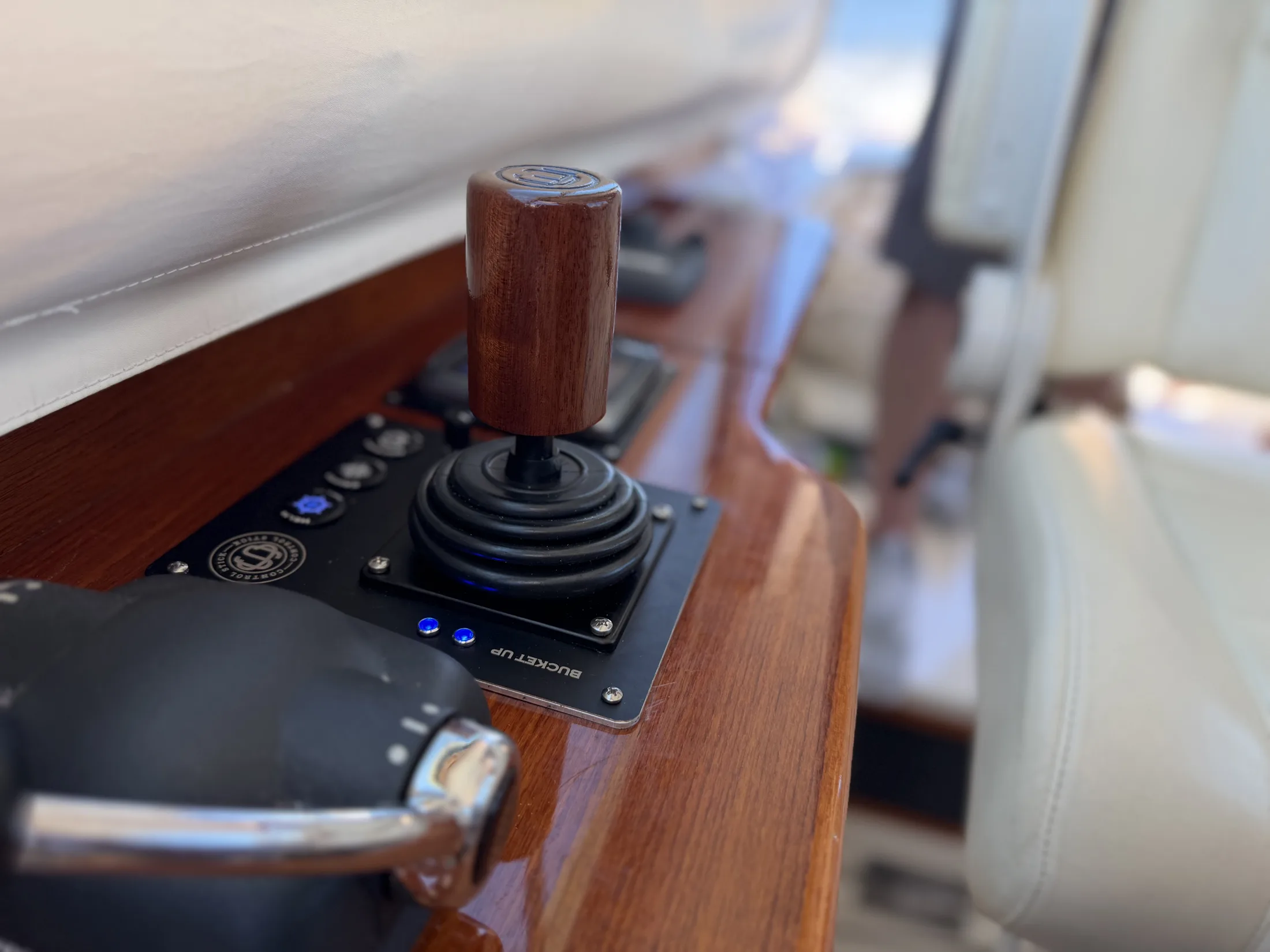 Hamilton Jet controls in a varnished teak helm, installed by our crew