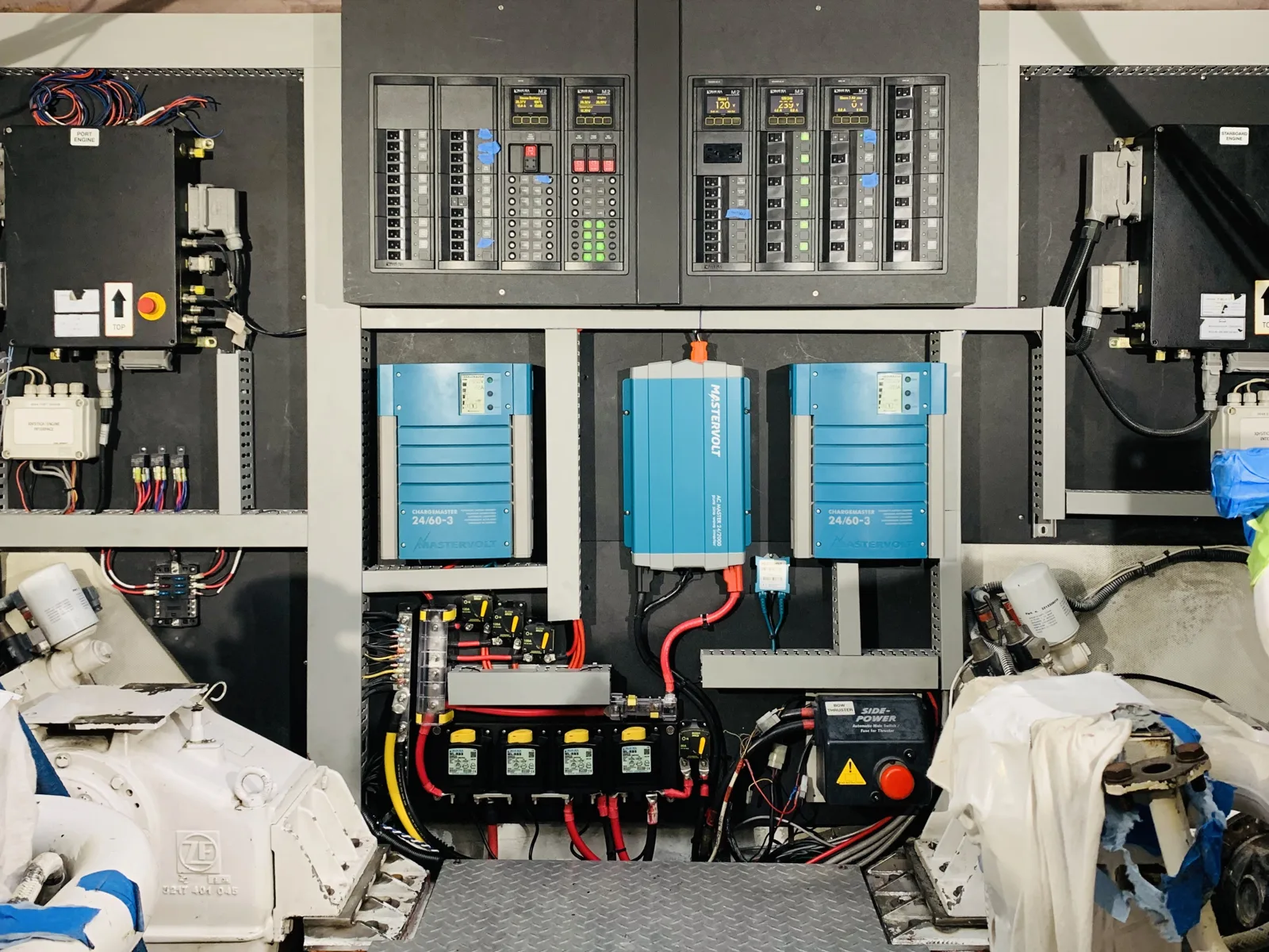 Full electrical refit wall with Victron chargers and new breaker panels