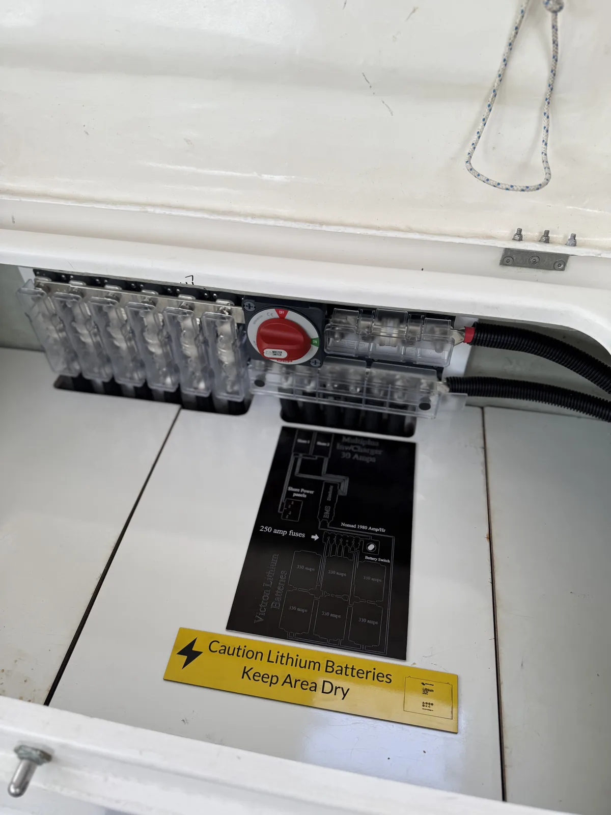 Custom lithium battery bank installed in a sealed locker